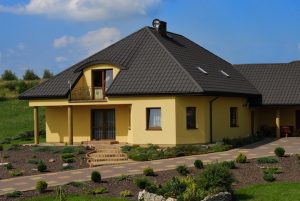 Pokrycia dachowe i elewacyjne Purmat